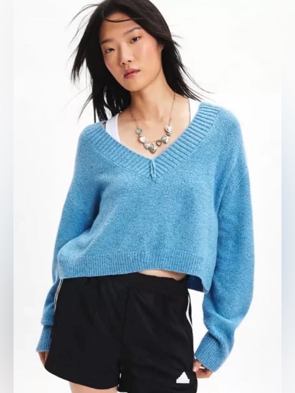 BDG - Cropped V-neck Blue Sweater. Polyester. Soft to the touch. Oversized